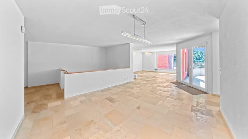 Empty room with tiled floor, white walls, and large windows with a view of greenery. No furniture or equipment present.