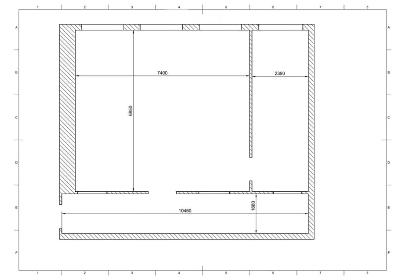 Floor plan of a rectangular room with labeled dimensions and sections, including a central space and surrounding walls.
