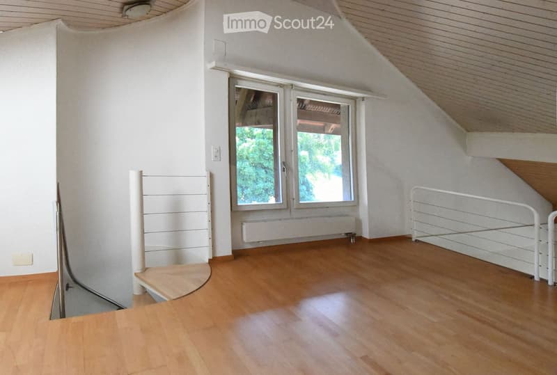 white walls, wooden floor, white window, spiral staircase