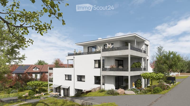 Modern two-story house with white facade, large windows, balconies, and solar panels on the neighboring roof. The house features a well-maintained garden with seating area and decorative plants.