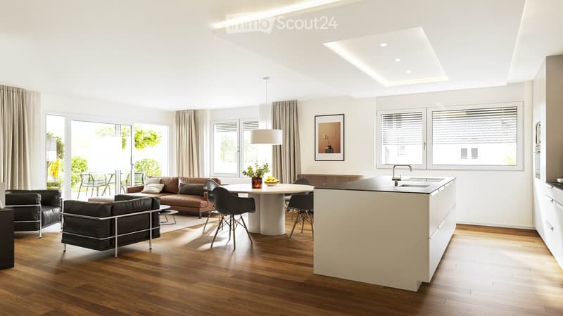 Open-plan living and dining area with a modern kitchen island, leather sofa, armchairs, coffee table, dining table, and chairs. Large windows with curtains and a pendant light.