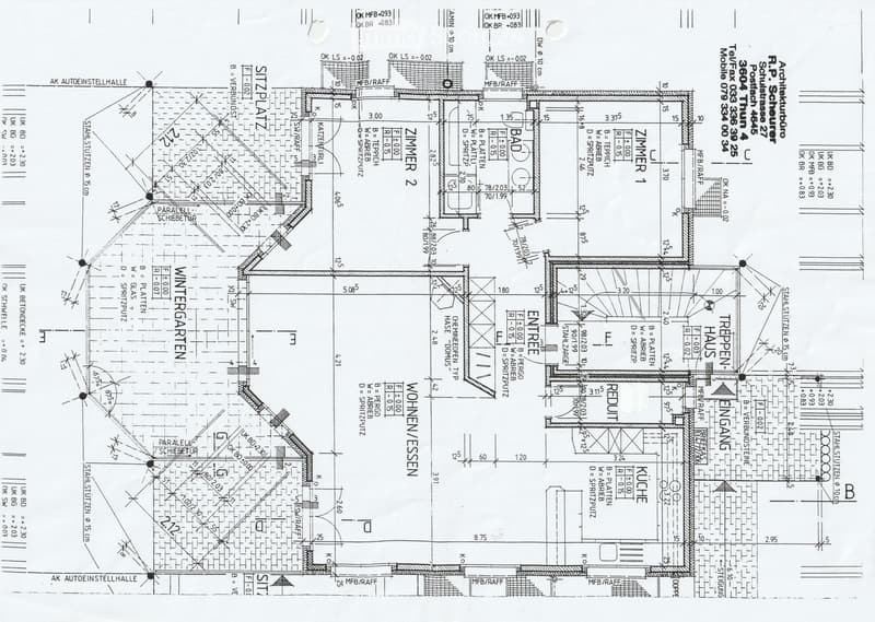 Floor plan of a house with labeled rooms including entrance, kitchen, living/dining area, bedrooms, bathroom, and winter garden.