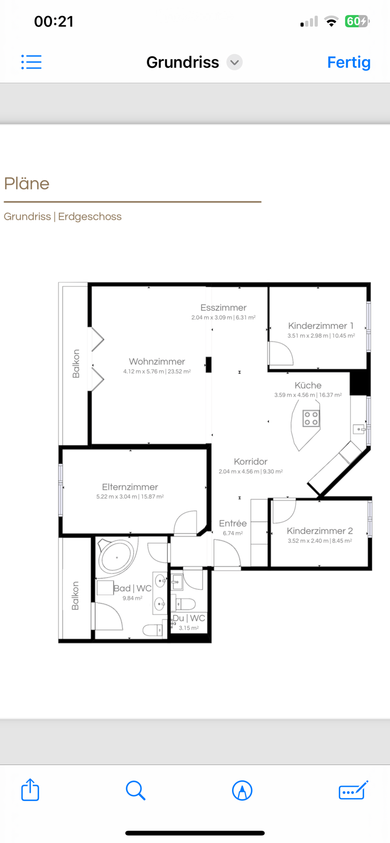 Floor plan of a ground floor showing living room, dining room, two bedrooms, kitchen, hallway, entrance, and two bathrooms.