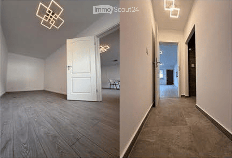 Empty room with wooden flooring and white walls, featuring a white door and a glimpse of another room with a chair and table in the background.