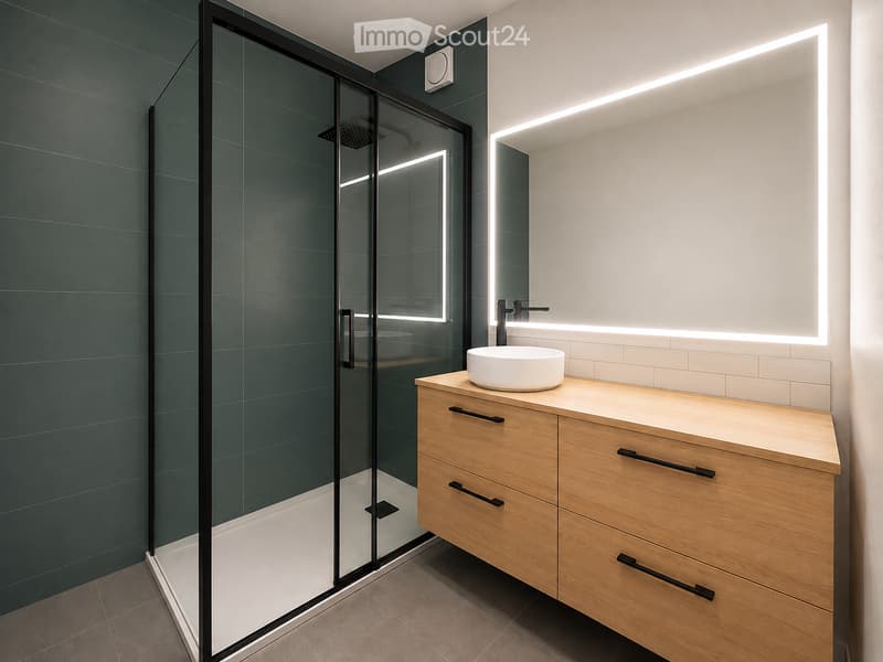 Modern bathroom with a wooden vanity cabinet, a white sink, a sleek glass shower enclosure, and built-in LED lighting above the mirror.
