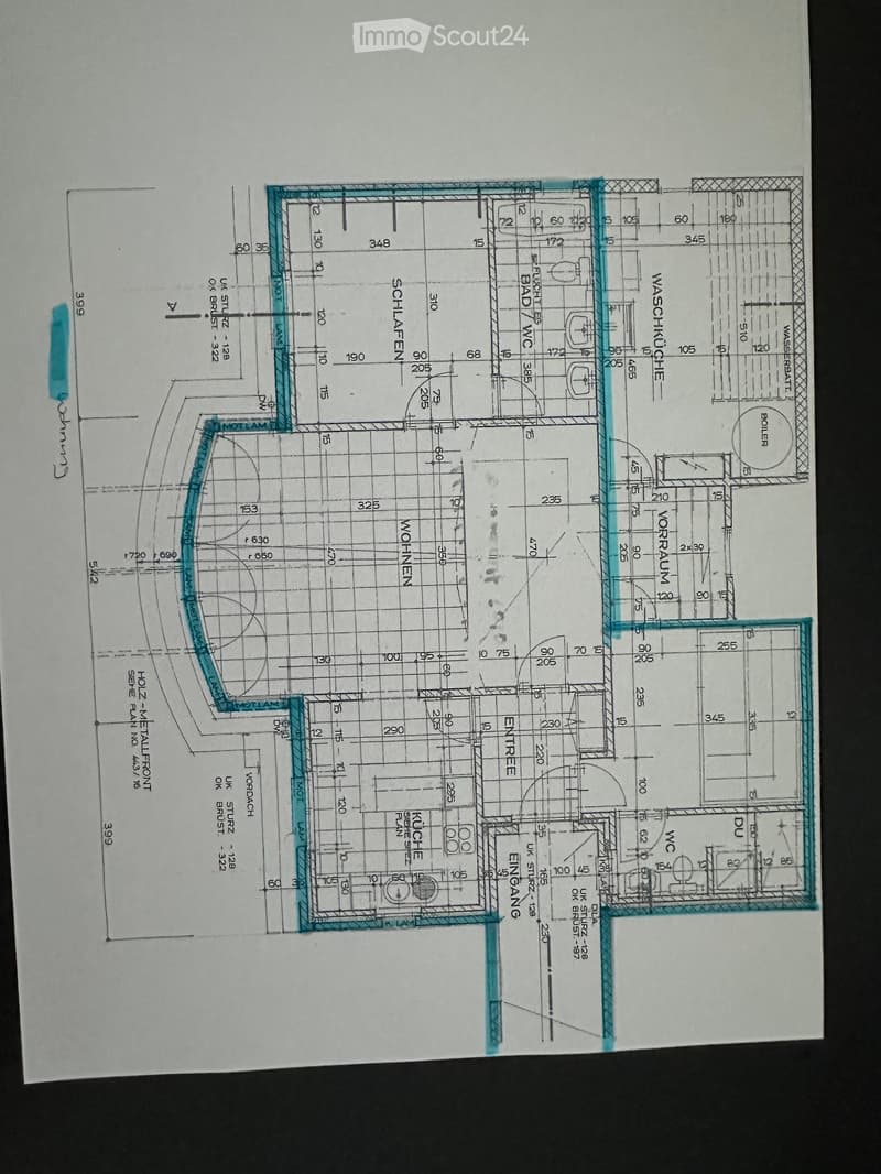 Floor plan of a house with labeled rooms including kitchen, living room, bedrooms, bathrooms, and entrance.