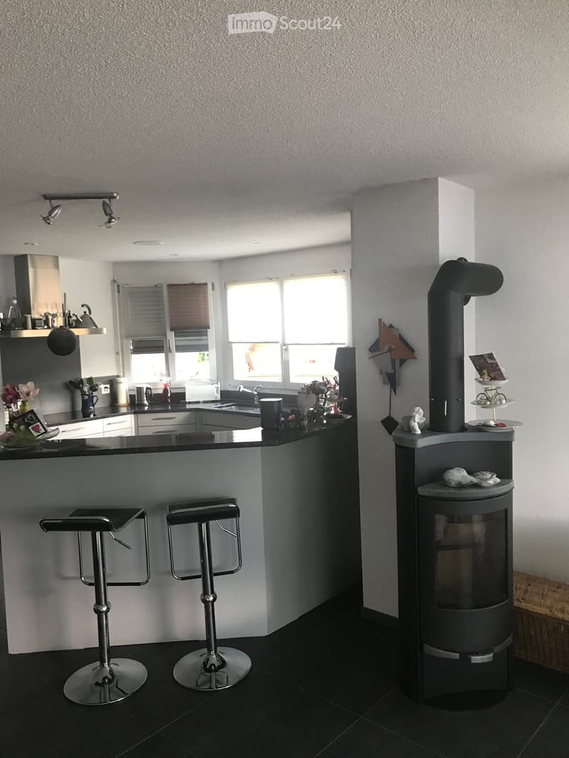 {"type": "Kitchen", "objects": ["bar stools", "kitchen island", "sink", "faucet", "fridge", "oven", "cupboard", "faucet", "fridge", "oven", "cupboard", "stool", "stool", "faucet", "cupboard", "cupboard", "cupboard", "cupboard", "cupboard", "cupboard", "cu