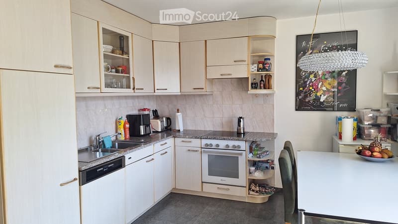 {"type": "Kitchen", "objects": ["sink", "faucet", "oven", "dishwasher", "coffee maker", "toaster", "cupboard", "bottle", "chair", "table", "fridge", "bottle", "cupboard", "bottle", "bottle", "bottle", "bottle", "bottle", "bottle", "bottle", "bottle", "bot