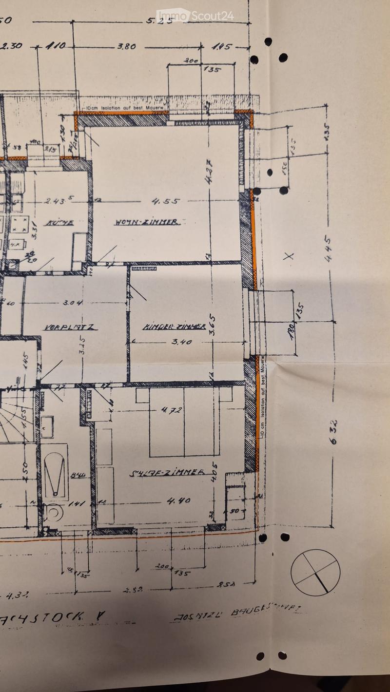 Floor plan of a 4-story building showing labeled rooms including kitchen, living room, children's room, and bedroom. Dimensions and wall details are indicated.