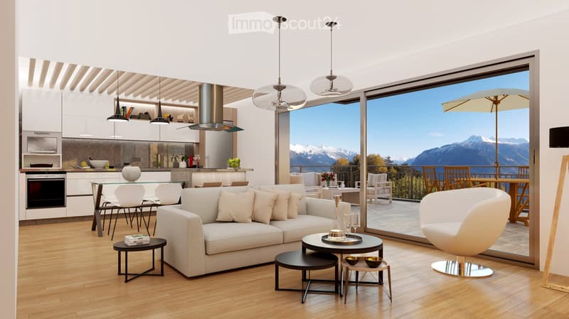 Modern open-plan living and dining area with a sofa, coffee table, dining table, and kitchen island. Large windows offer a scenic mountain view.