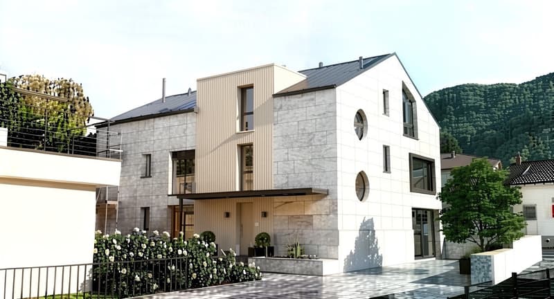Modern two-story house with a combination of concrete and wood exterior, large windows, and a balcony with greenery. The house is surrounded by a landscaped garden with white flowers and shrubs, and there is a scenic mountain view in the background.