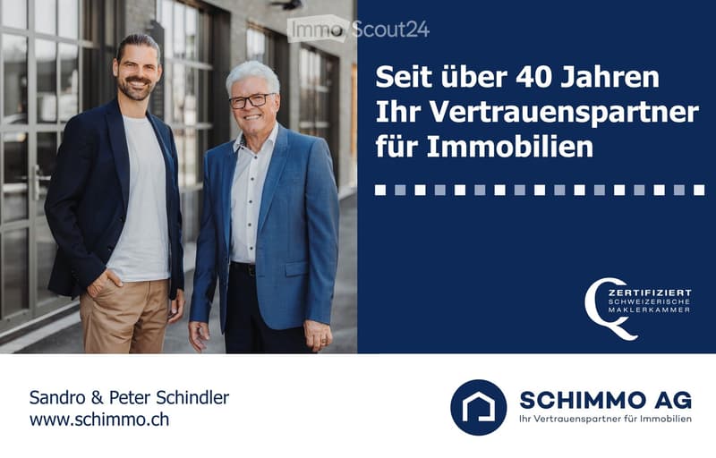 Promotional image for real estate services featuring two men in front of a modern building with large windows. The text highlights over 40 years of experience as trusted partners for real estate.