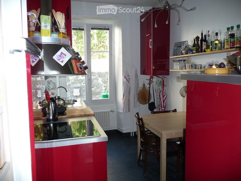 {"type": "Kitchen", "objects": ["refrigerator", "oven", "table", "chair", "cabinets", "kitchen utensils", "bottle", "faucet", "oven", "cupboard", "cupboard", "cupboard", "cupboard", "cupboard", "cupboard", "cupboard", "cupboard", "cupboard", "cupboard", "