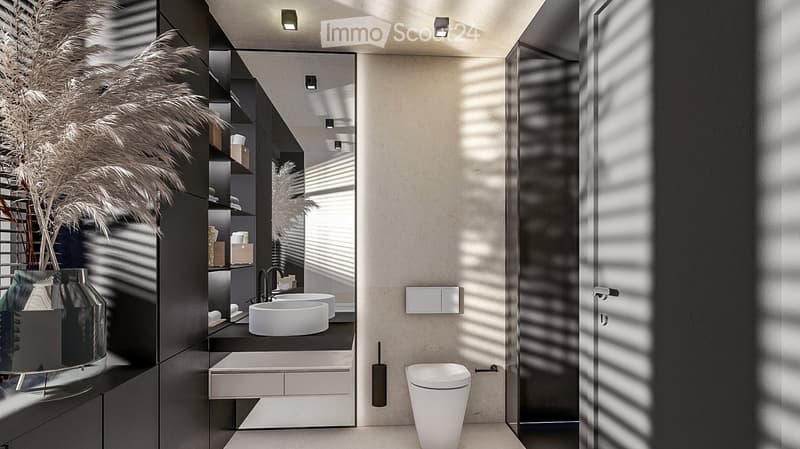 Modern bathroom with white fixtures, black shelving, and decorative plants. The room features recessed lighting and a minimalist design.