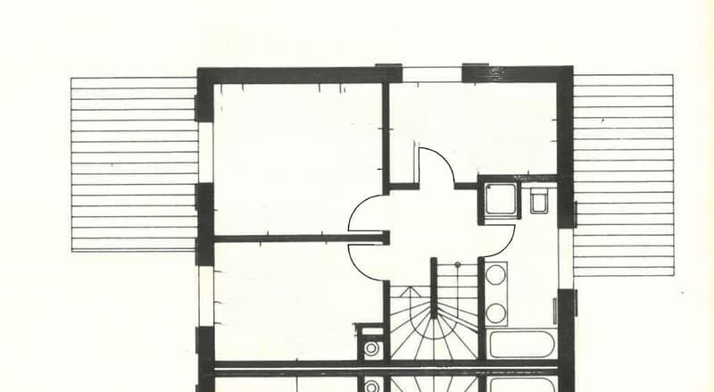 Floor plan of a house with a living room, dining area, kitchen, three bedrooms, and two bathrooms.
