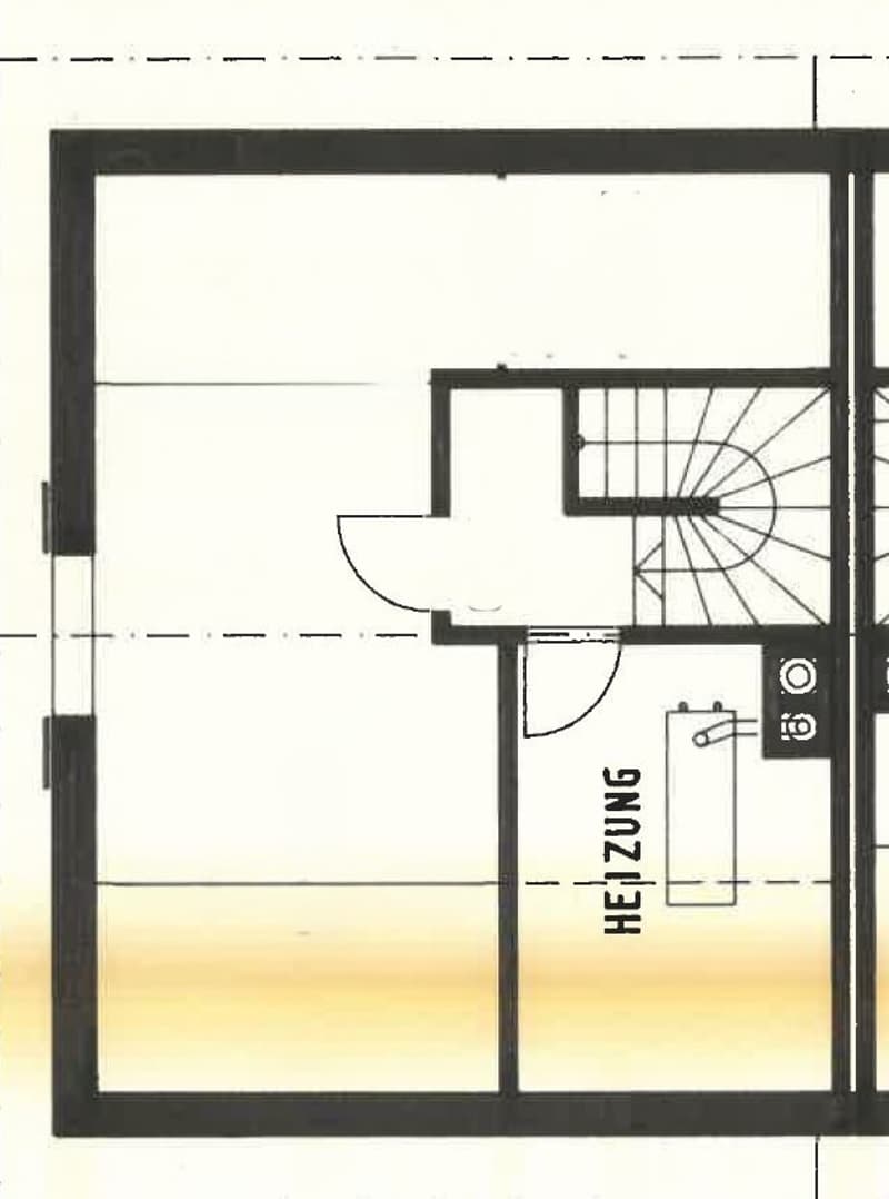 Floor plan of a small apartment with a living area, kitchen, and bathroom. The layout includes a curved wall and a staircase leading to an upper level.