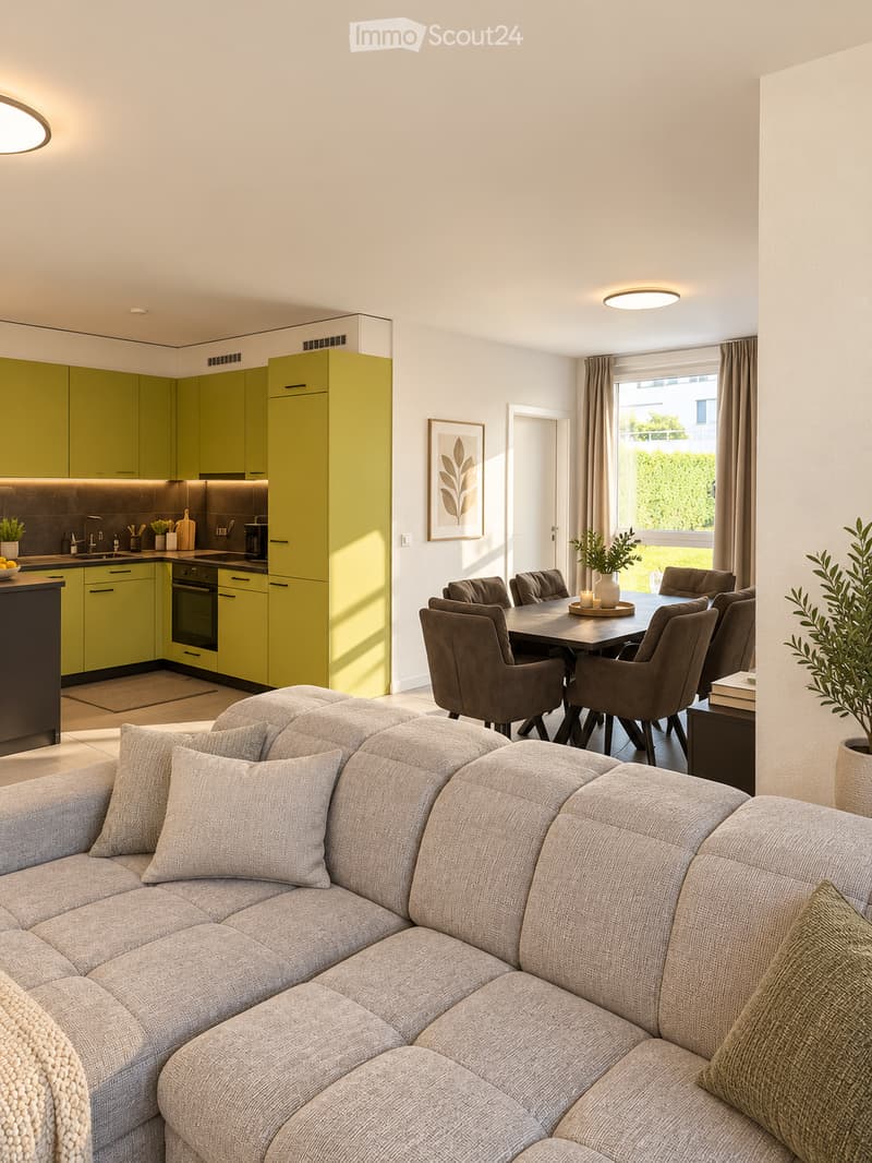 Modern living and dining area with a grey sectional sofa, dining table with six chairs, green kitchen cabinets, and a window with curtains.