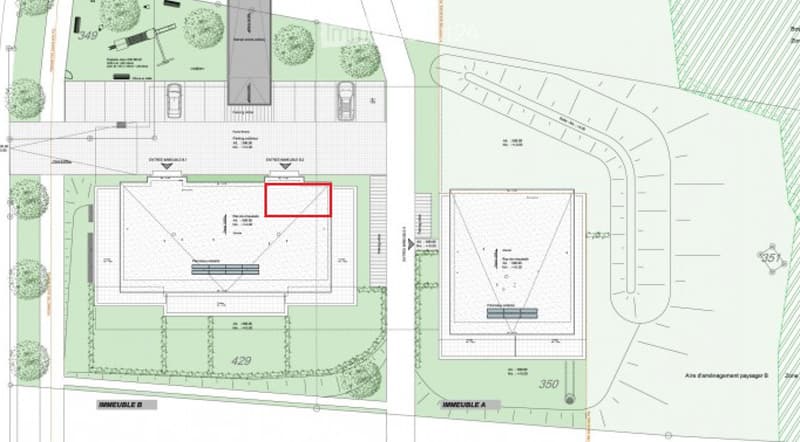 Floor plan of a residential property showing multiple buildings, parking areas, and landscaped outdoor spaces.