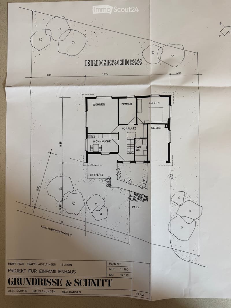 Ground floor and first floor layout of a single-family house, including living room, kitchen, bedroom, bathroom, garage, and outdoor seating area.