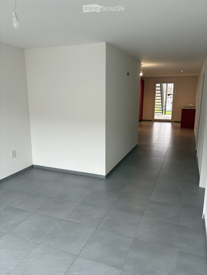 empty room, tiled floor, white walls, open door, white ceiling, light