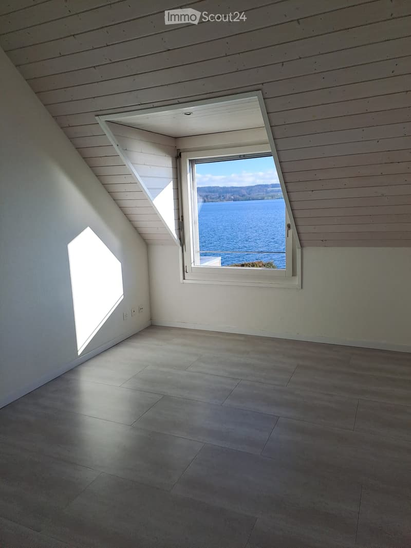 empty room, tiled floor, triangular window with view