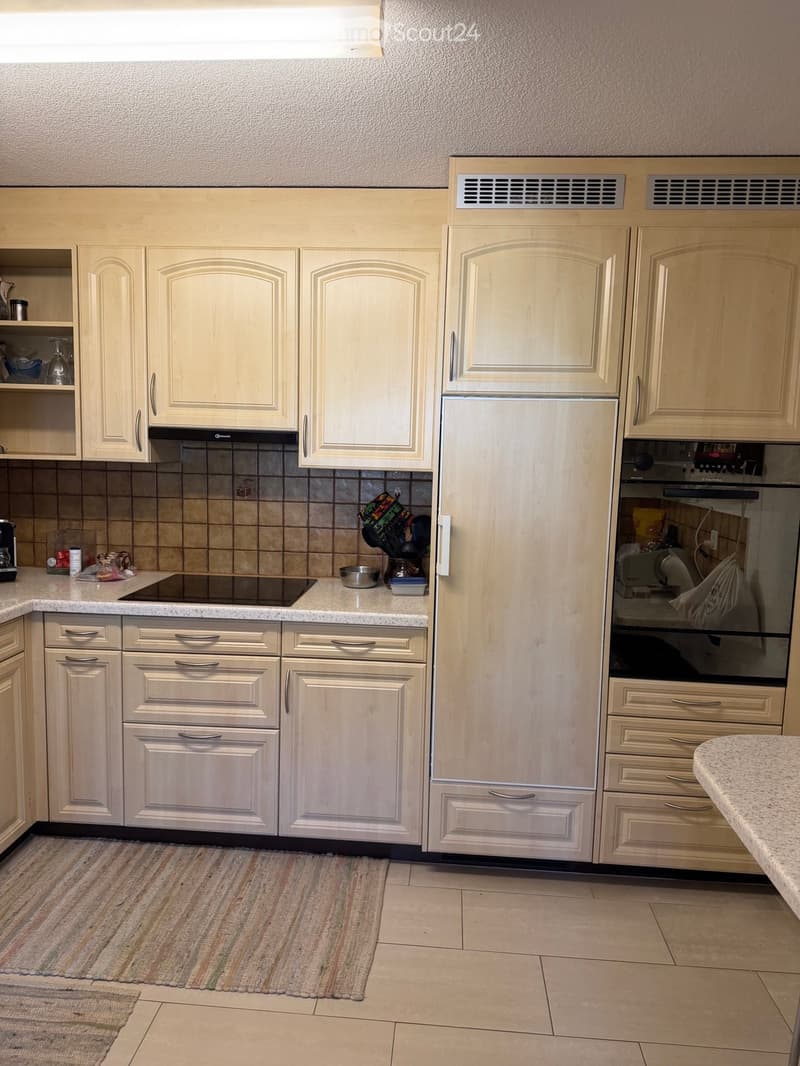 {"type": "Kitchen", "objects": ["refrigerator", "oven", "stove", "cabinets", "countertop", "oven mitts", "coffee maker", "oven mitts", "oven", "oven", "oven", "oven", "oven", "oven", "oven", "oven", "oven", "oven", "oven", "oven", "oven", "oven", "oven",