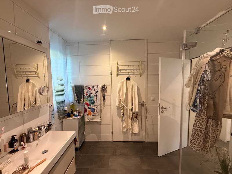 {"type": "Bathroom", "objects": ["sink", "mirror", "bathrobe", "towel", "bathrobe", "towel", "bathrobe", "towel", "bathrobe", "towel", "bathrobe", "towel", "bathrobe", "towel", "bathrobe", "towel", "bathrobe", "towel", "bathrobe", "towel", "bathrobe", "to