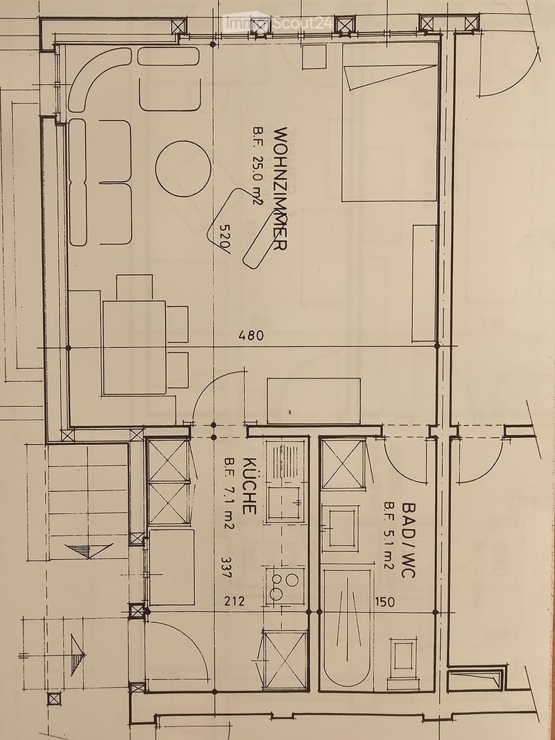 Floor plan showing a living area, kitchen, bathroom/WC, and bedroom with labeled dimensions.
