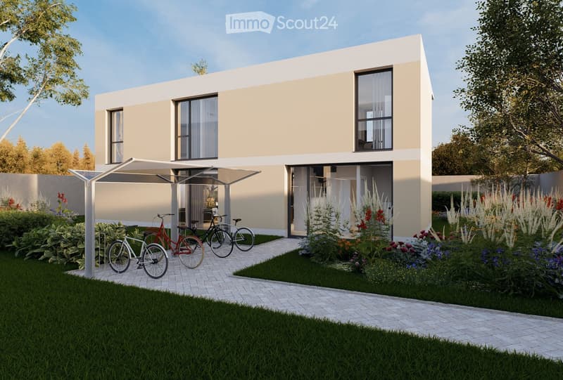Modern two-story house with light beige and white exterior, large windows, covered patio area, and landscaped garden with bicycles parked under the patio.