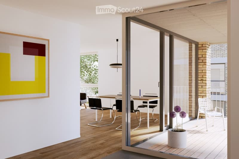 Modern dining area with wooden flooring, large glass partition leading to a balcony, white chairs, a table, and a pendant light.