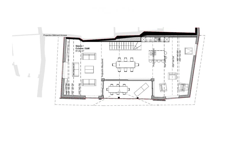 Floor plan of a building showing a living/dining area, kitchen, and mezzanine level with tables and chairs.