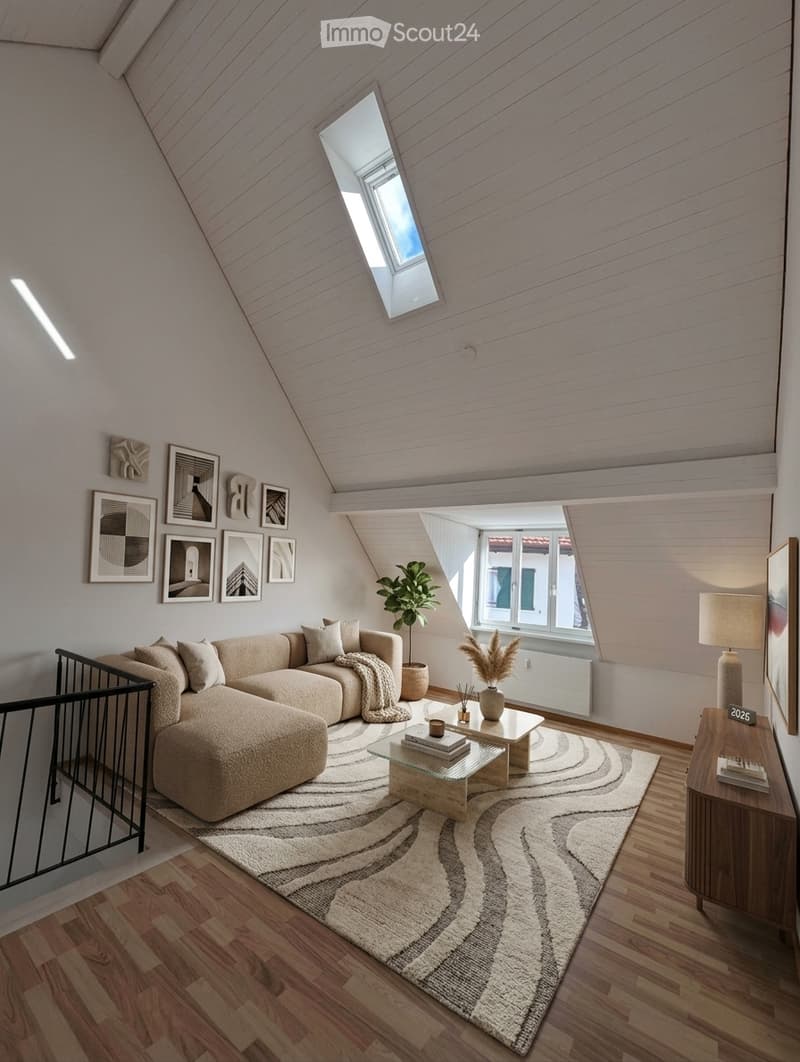 Modern living room with a sectional sofa, coffee table, side table, floor lamp, plant, and picture frames on the wall. The room features wooden flooring and a large skylight.