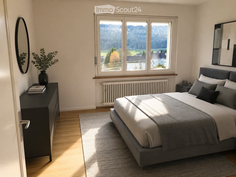 Modern bedroom with a large bed, nightstand, mirror, vase with greenery, and books on a dresser. Large windows offer a scenic view.