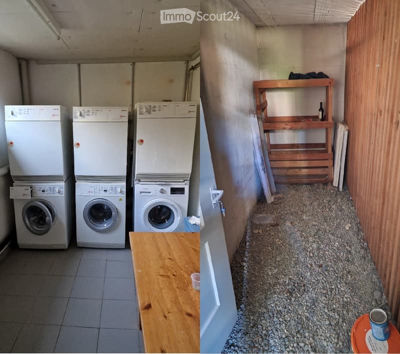 A small utility room with three washing machines, a wooden table, a wooden shelf, and a cup on a small round table.