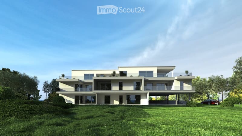 Modern two-story house with large windows, balconies, and a flat roof, surrounded by a green lawn and trees.