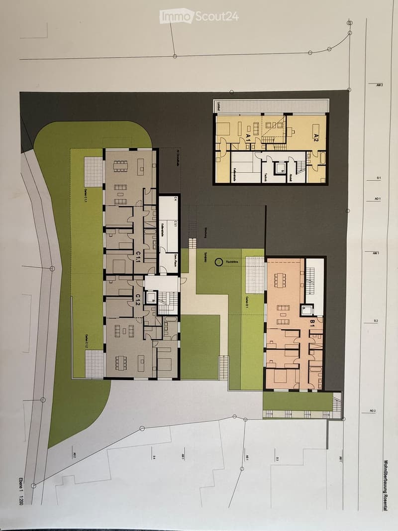 Floor plan of a multi-unit residential building with labeled apartments, common areas, and outdoor spaces.