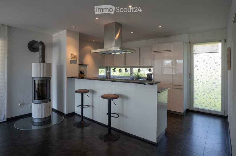 {"type": "Kitchen", "objects": ["fireplace", "stool", "stool", "faucet", "sink", "refrigerator", "cabinet", "cabinet", "cabinet", "cabinet", "cabinet", "cabinet", "cabinet", "cabinet", "cabinet", "cabinet", "cabinet", "cabinet", "cabinet", "cabinet", "cab