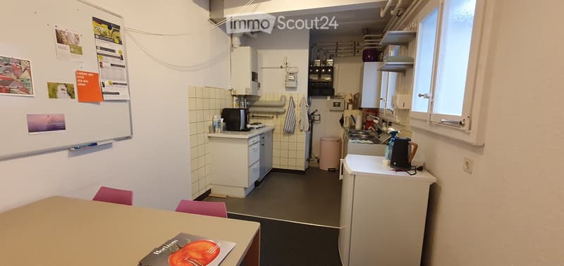 {"type": "Furnished Room", "objects": ["table", "chair", "fridge", "sink", "microwave", "cupboard", "faucet", "towel", "cup", "fridge", "oven", "faucet", "cupboard", "cupboard", "cupboard", "cupboard", "cupboard", "cupboard", "cupboard", "cupboard", "cupb