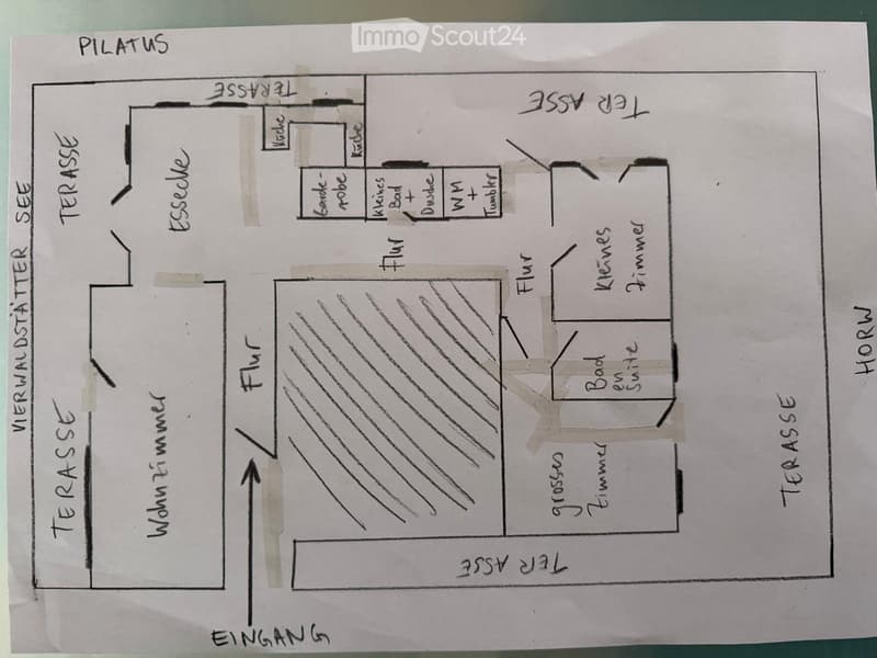 Hand-drawn floor plan showing two floors with labeled rooms including living room, kitchen, bedrooms, bathrooms, and terraces.