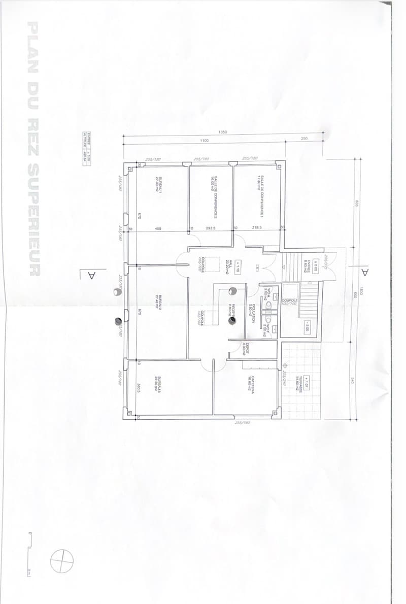 Layout of a commercial or office space featuring multiple rooms including offices, conference room, reception, and a kitchen area.