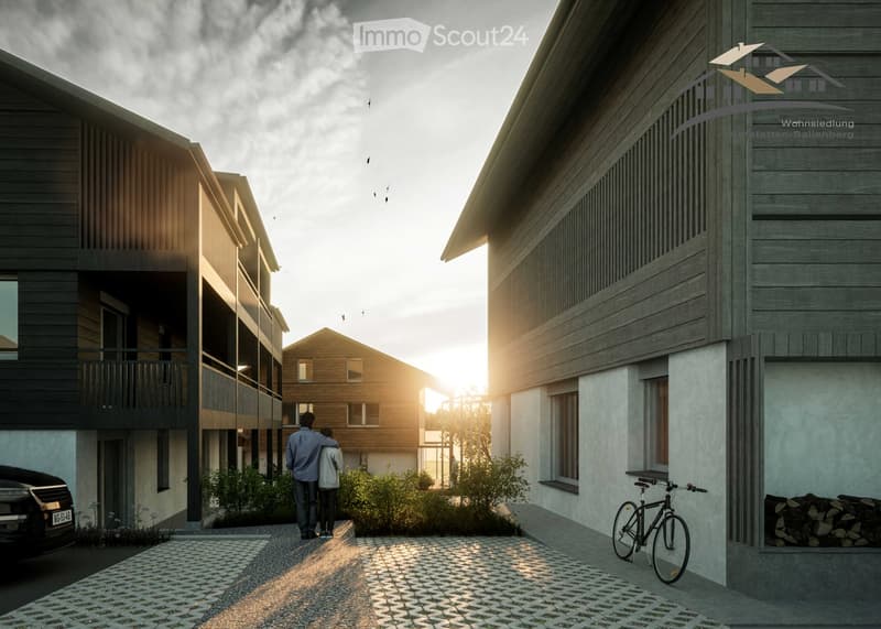 3 story apartment building, wooden facade, balcony, car in driveway