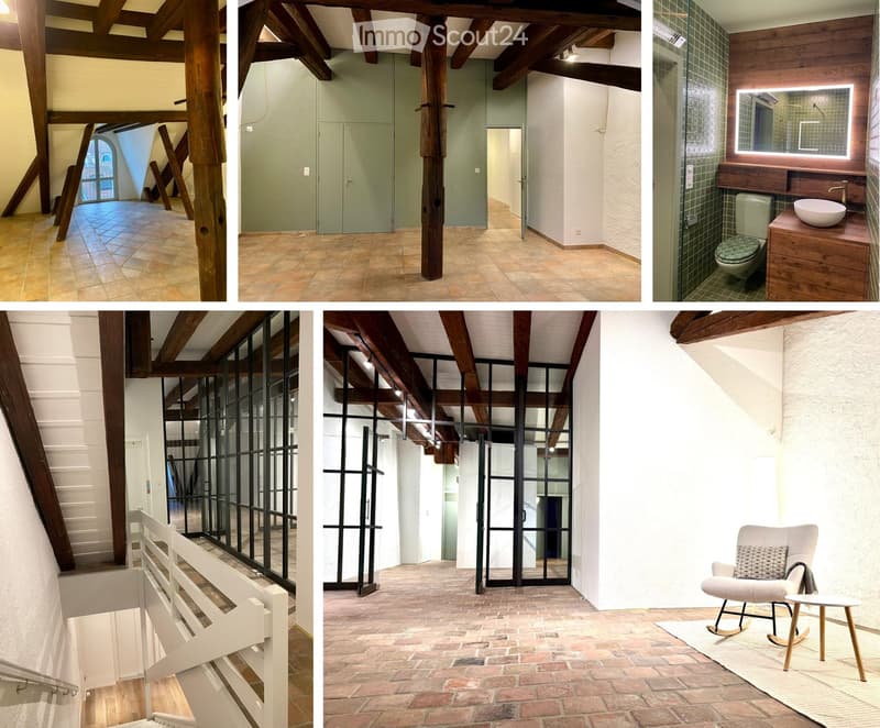 Exposed wooden beams, brick flooring, windows, and a chair in a room