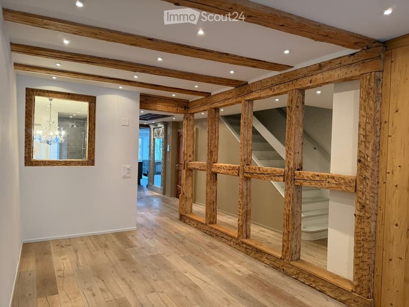 wooden ceiling, wooden paneling, hardwood floor, white wall, staircase