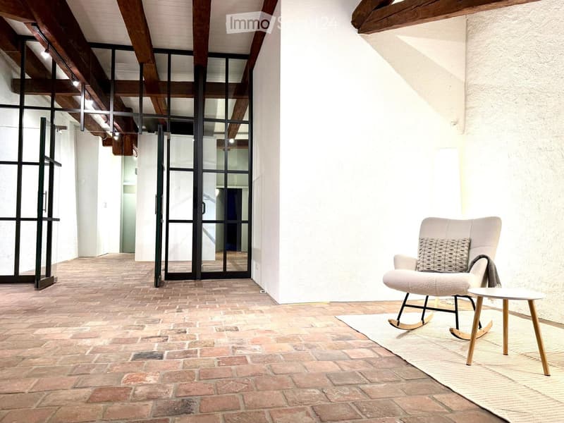 brick floor, modern architecture, large windows, wooden ceiling, modern furniture