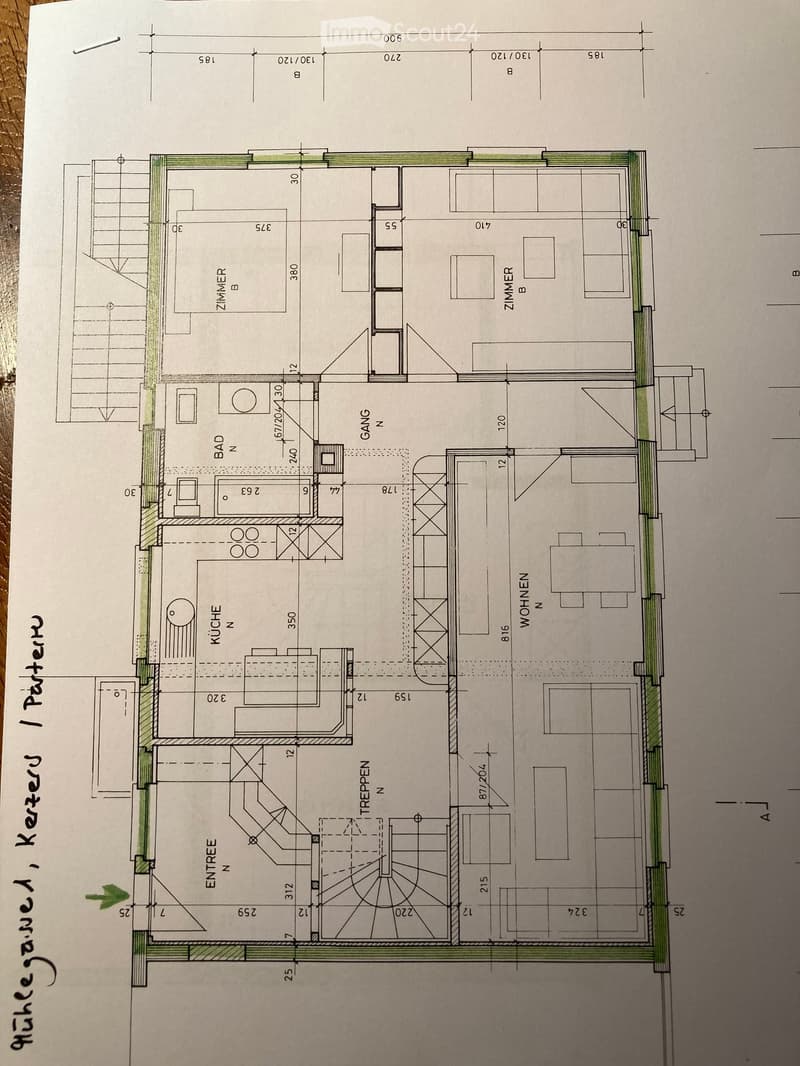 Floor plan showing a layout with labeled rooms including kitchen, bathroom, living area, bedrooms, and entrance.