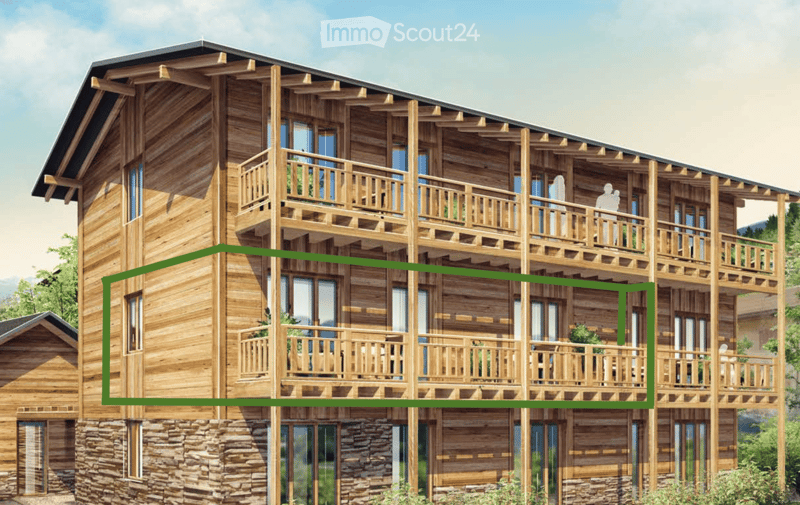 A multi-story wooden building with balconies, large windows, and a stone base. The structure features a combination of wooden and stone materials, with multiple levels connected by wooden railings.