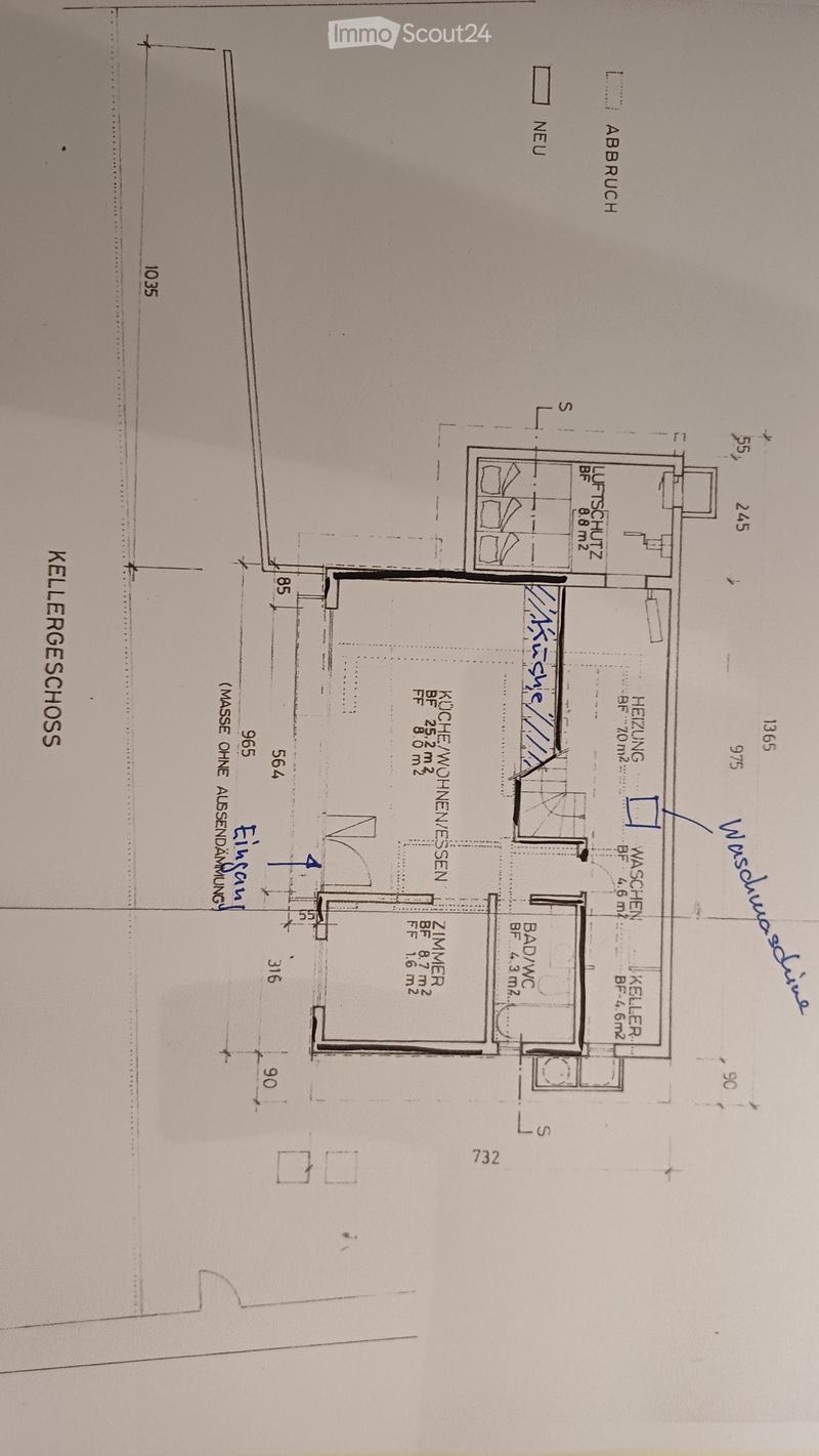 Floor plan of a basement level showing a kitchen, living room, bedroom, bathroom, and utility area.
