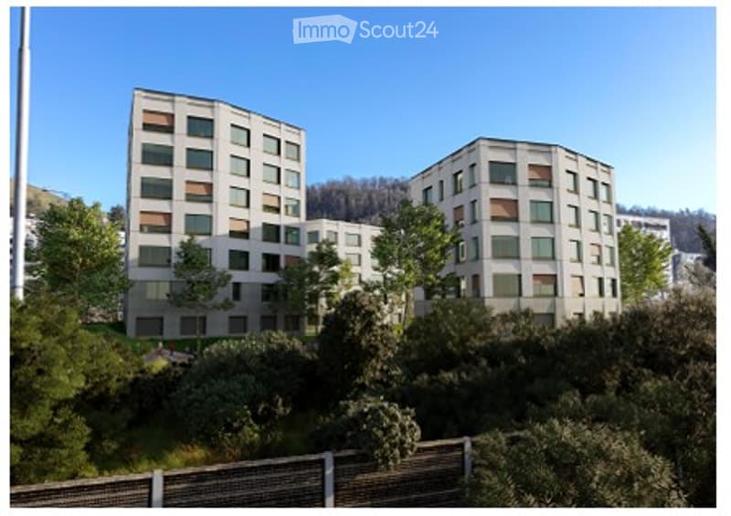 Modern multi-story residential building with white facade, large windows, and surrounding greenery.