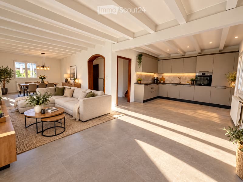 Open-plan living and dining area with a modern sofa, coffee table, side table, dining table, and chairs. The kitchen features sleek cabinets, an oven, and a coffee maker. The space is well-lit with large windows and has a contemporary design.