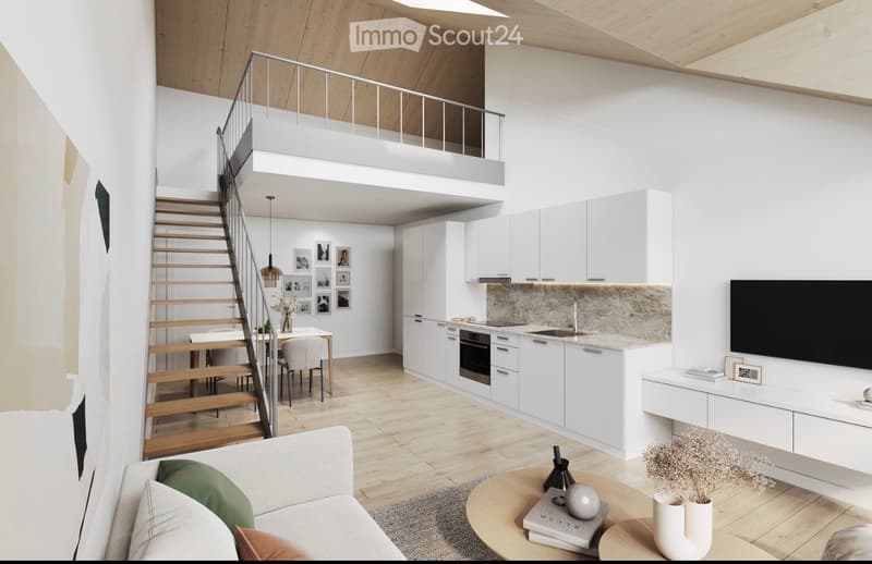 Modern open-plan living and dining area with a raised loft level, white kitchen cabinets, a sofa, coffee table, dining table with chairs, and decorative items.